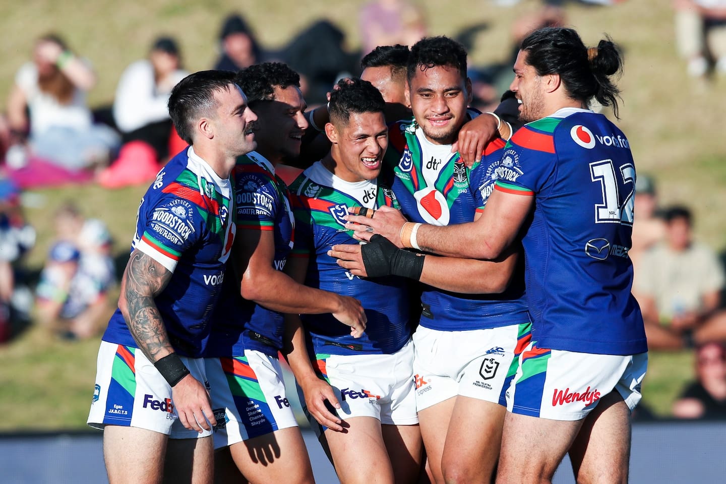 Warriors celebrate a try during the Covid era. Photo / Photosport Warriors celebrate a try during the Covid era. Photo / Photosport