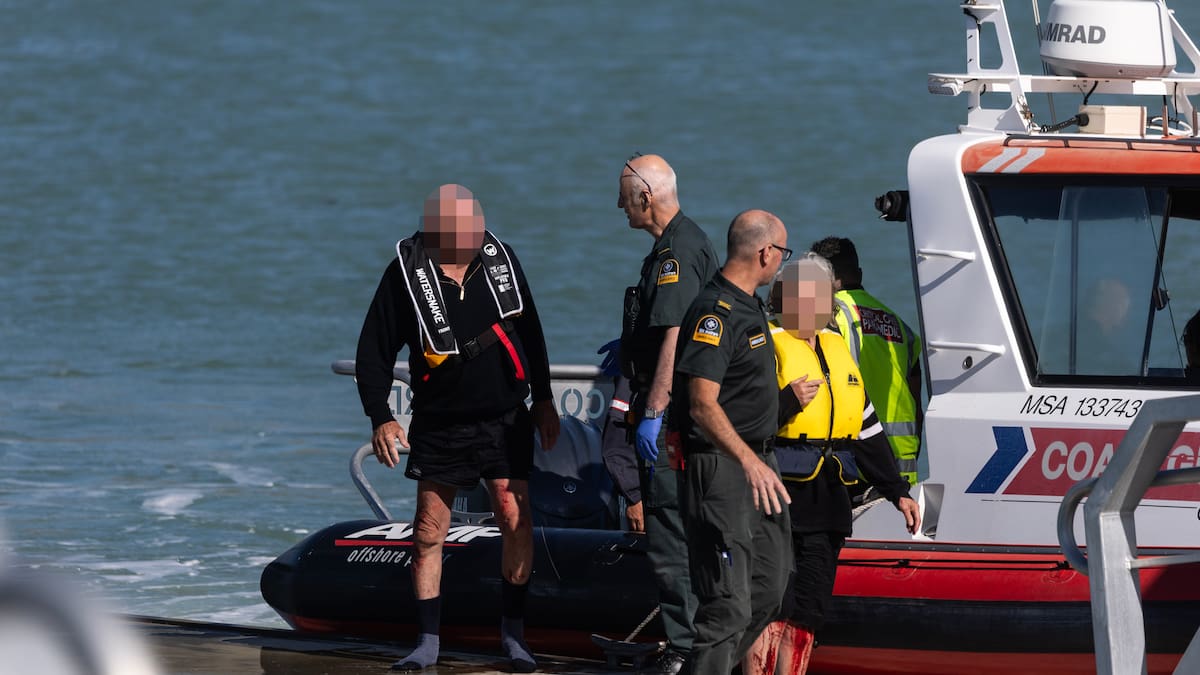 Harbour rescue: Two injured after boat capsizes Harbour rescue: Two injured after boat capsizes