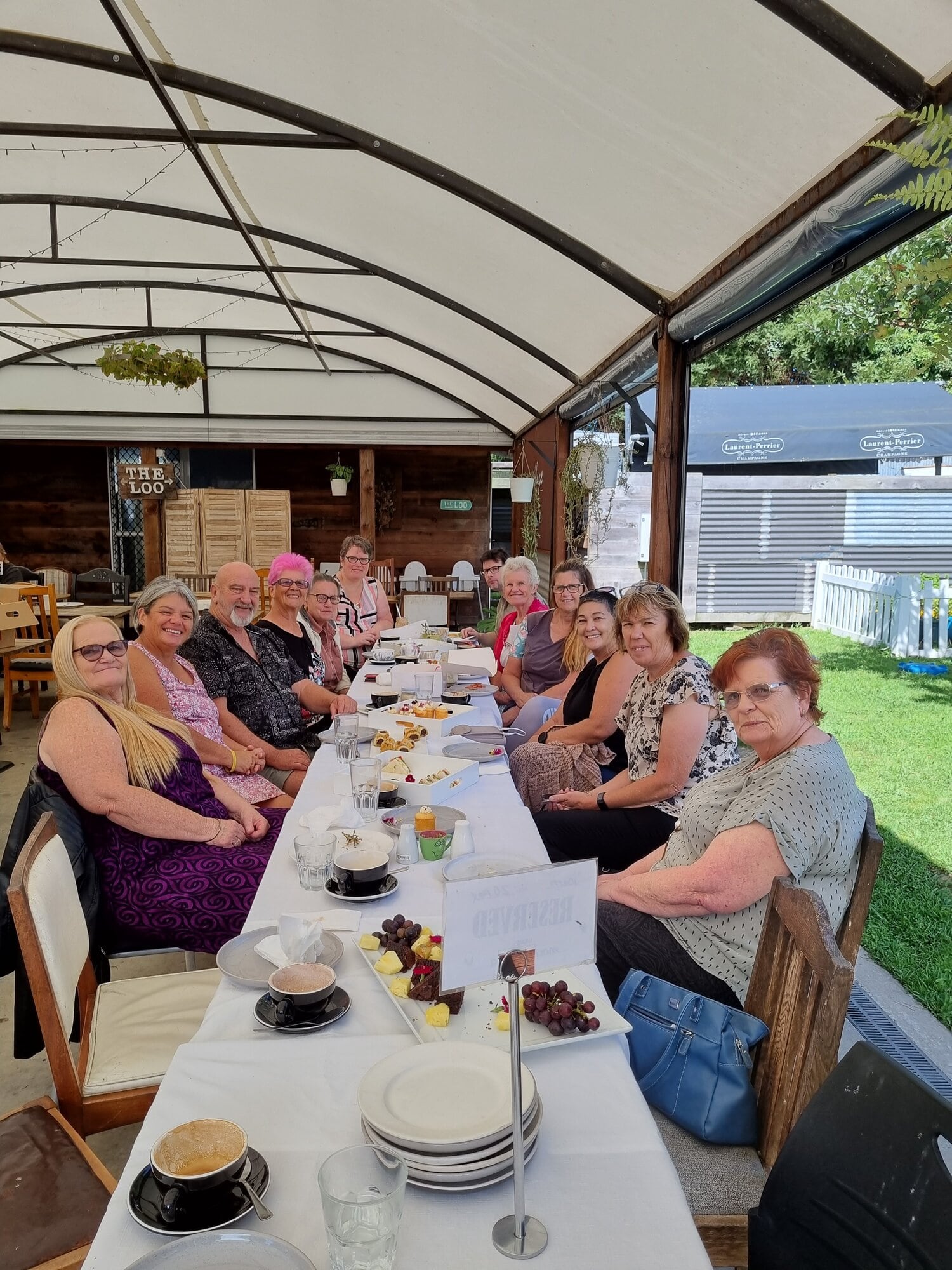 Nyvonne Krause, second on left, celebrates the challenges and triumphs of the caregiver’s journey with a local CFA support group. Photo / Supplied
