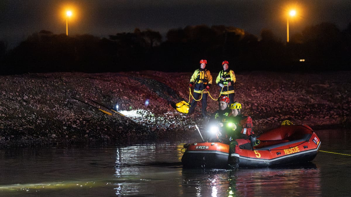 Car submerged in Christchurch river, emergency services at scene Car submerged in Christchurch river, emergency services at scene