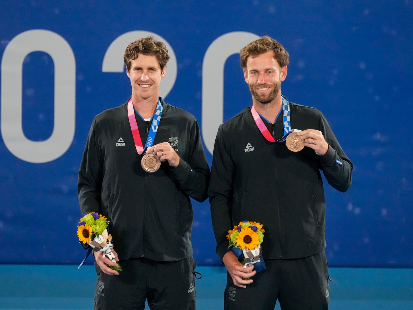New Zealand's Marcus Daniell (left) and Michael Venus with the Olympic Bronze medal. Photo / Photosport