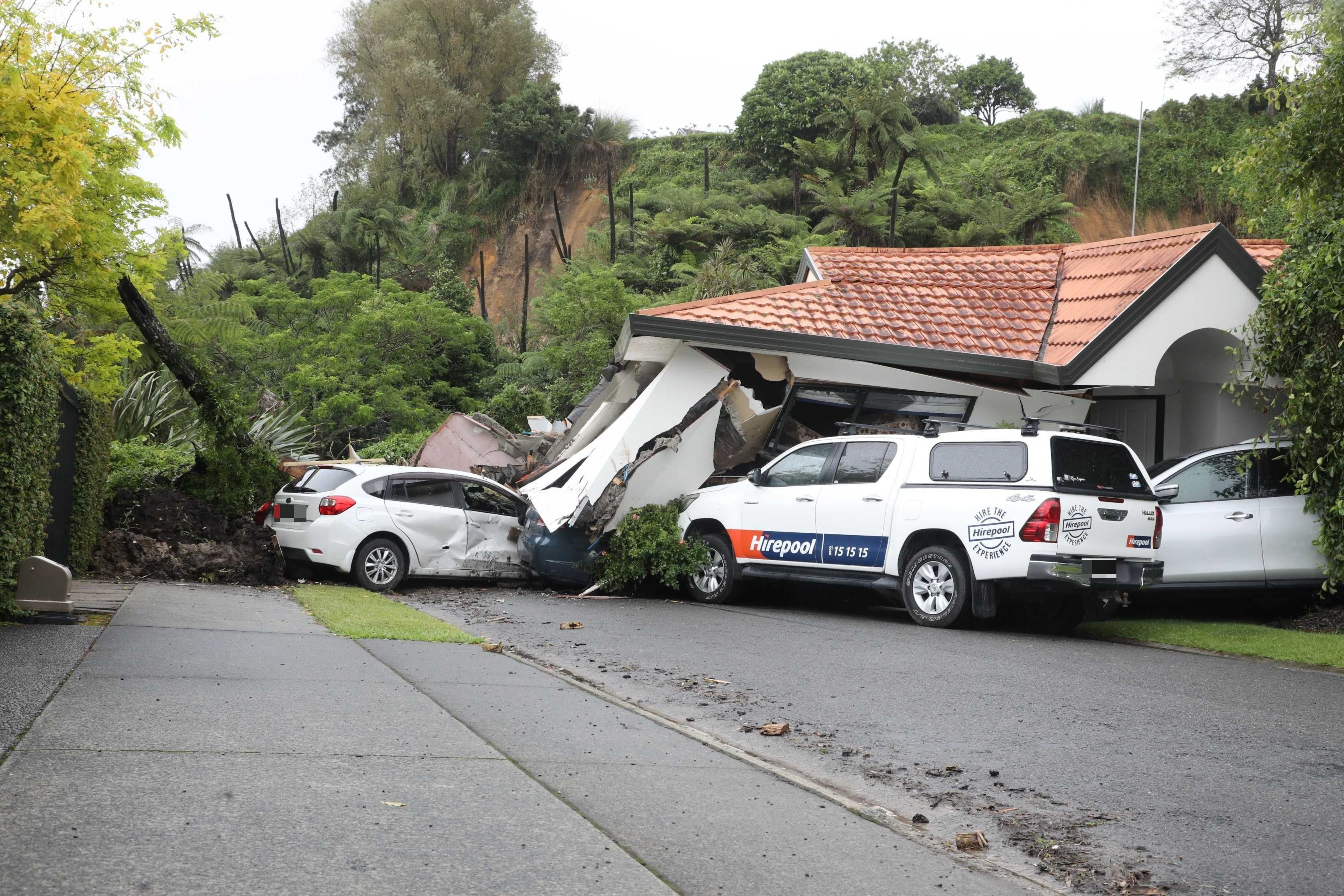 The January 2023 landslide fell on a house and cars in Maungatapu. Photo / Andrew Warner