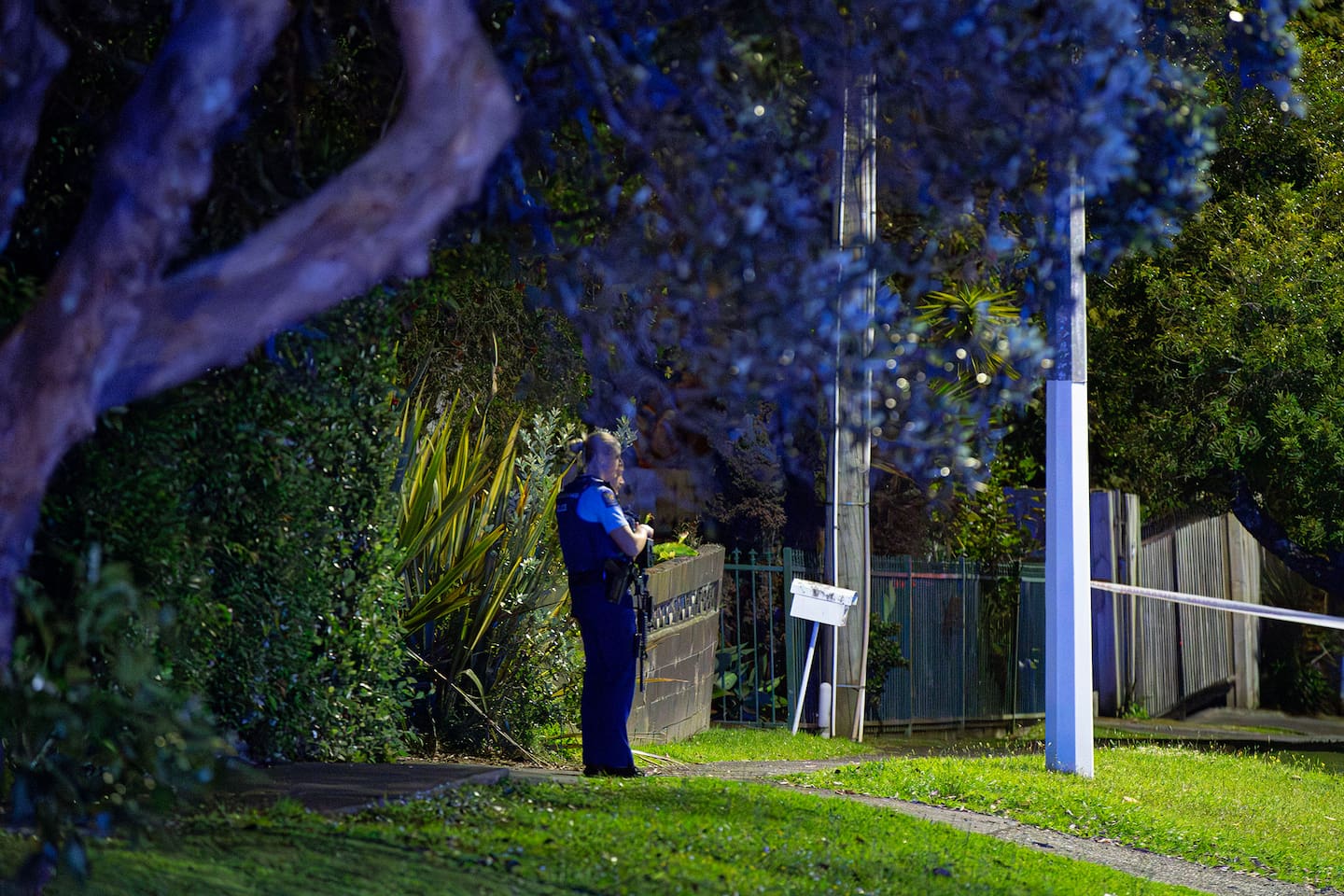 Armed police are stationed outside an address on Brandon Rd in Glen Eden following a serious incident. Photo / Hayden Woodward.