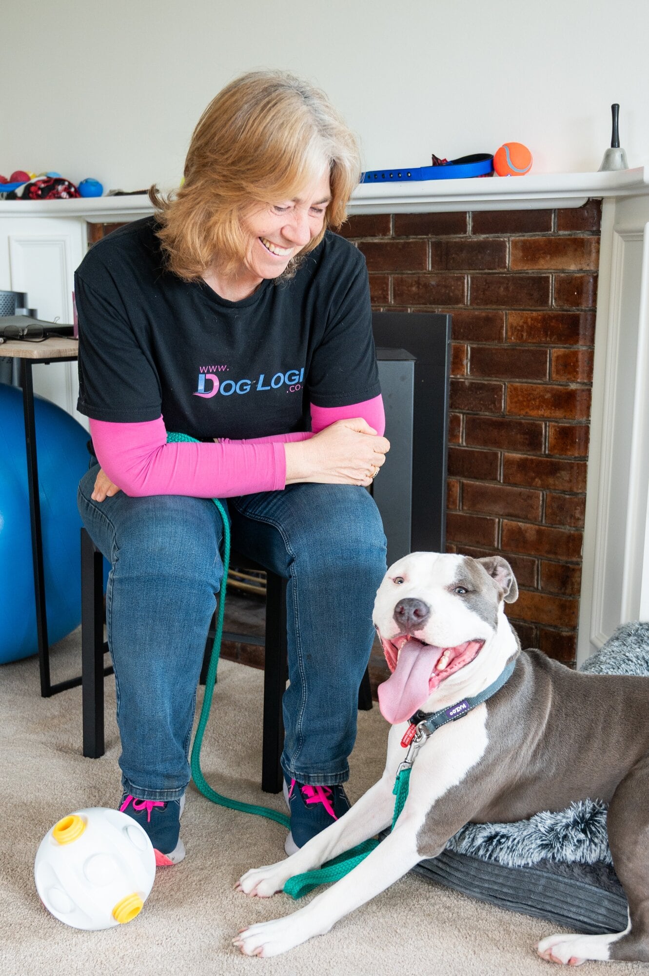 Maree Hart with a client's dog in her training room. Photo / Brydie Thompson
