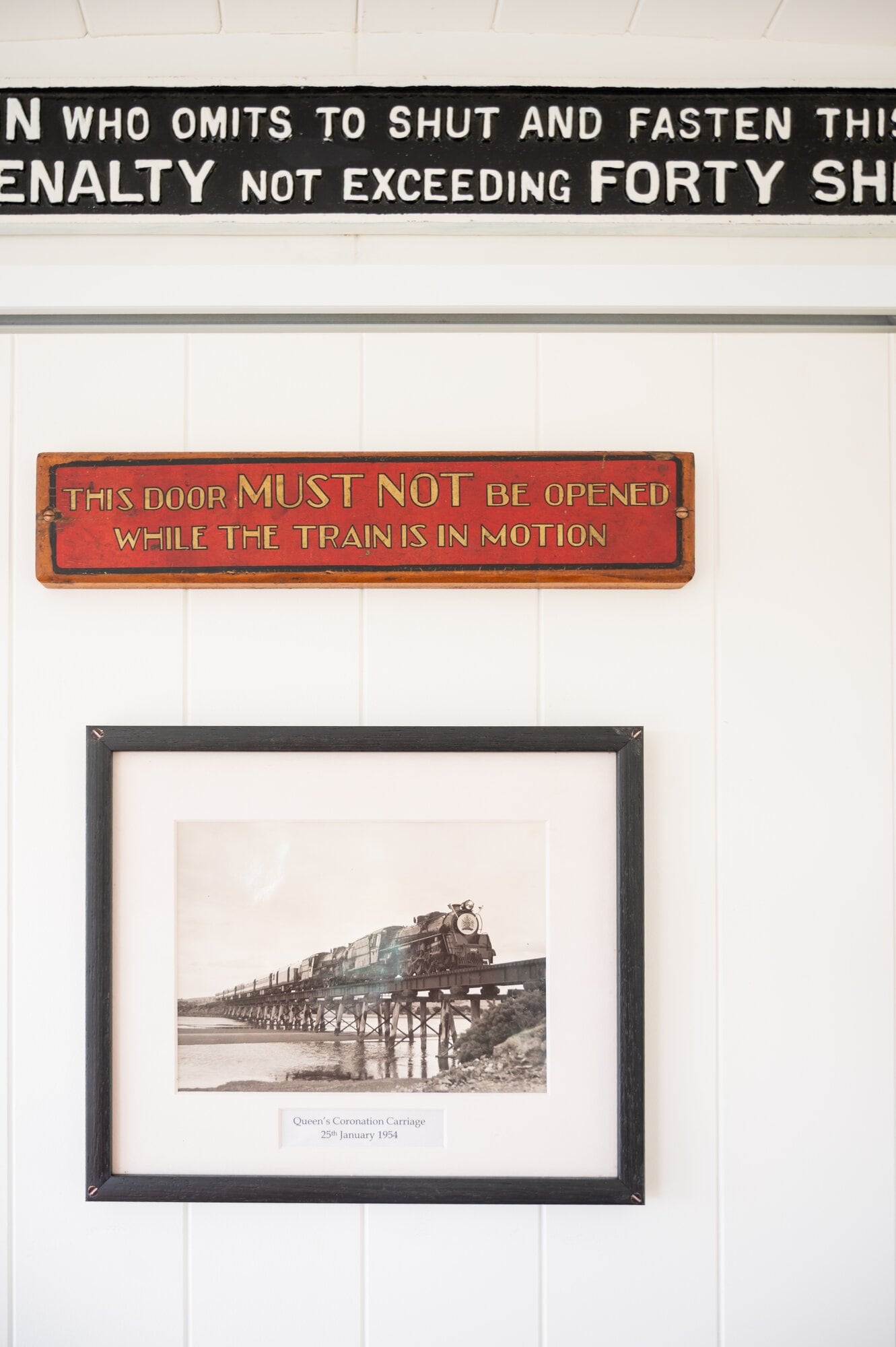  A framed photograph of Queen Elizabeth II’s royal train crossing a bridge in NZ during her 1954 tour. Photo / Brydie Thompson.