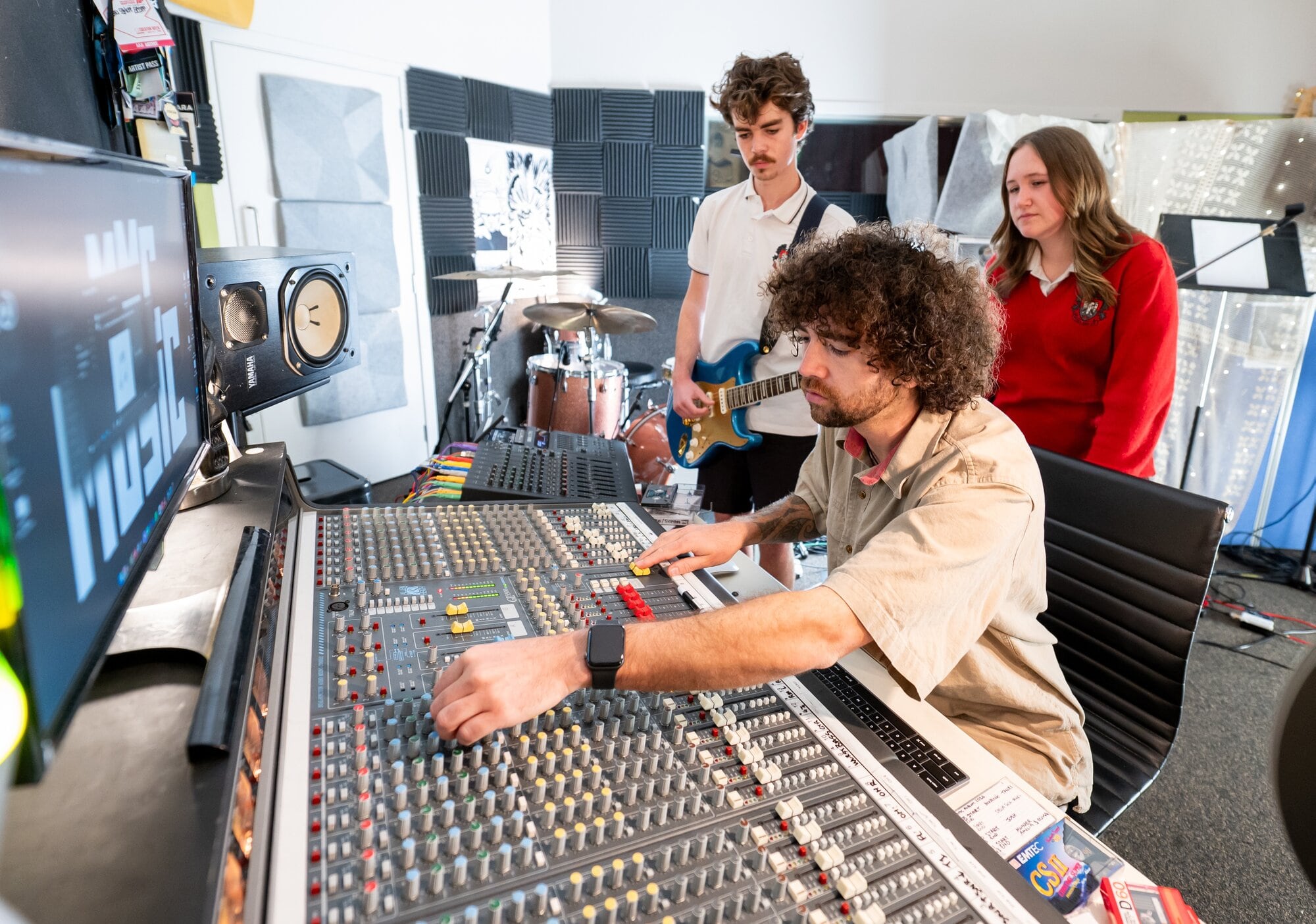 Mount Maunganui College students Lennox Lloyd, 16, and Mackenzie Petitpas, 14, learning the process with teacher Tia Beaufort. Photo / Brydie Thompson