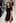 A model wears a design by Kate Sylvester as part of the Little Black Dress show. Photo / Getty Images