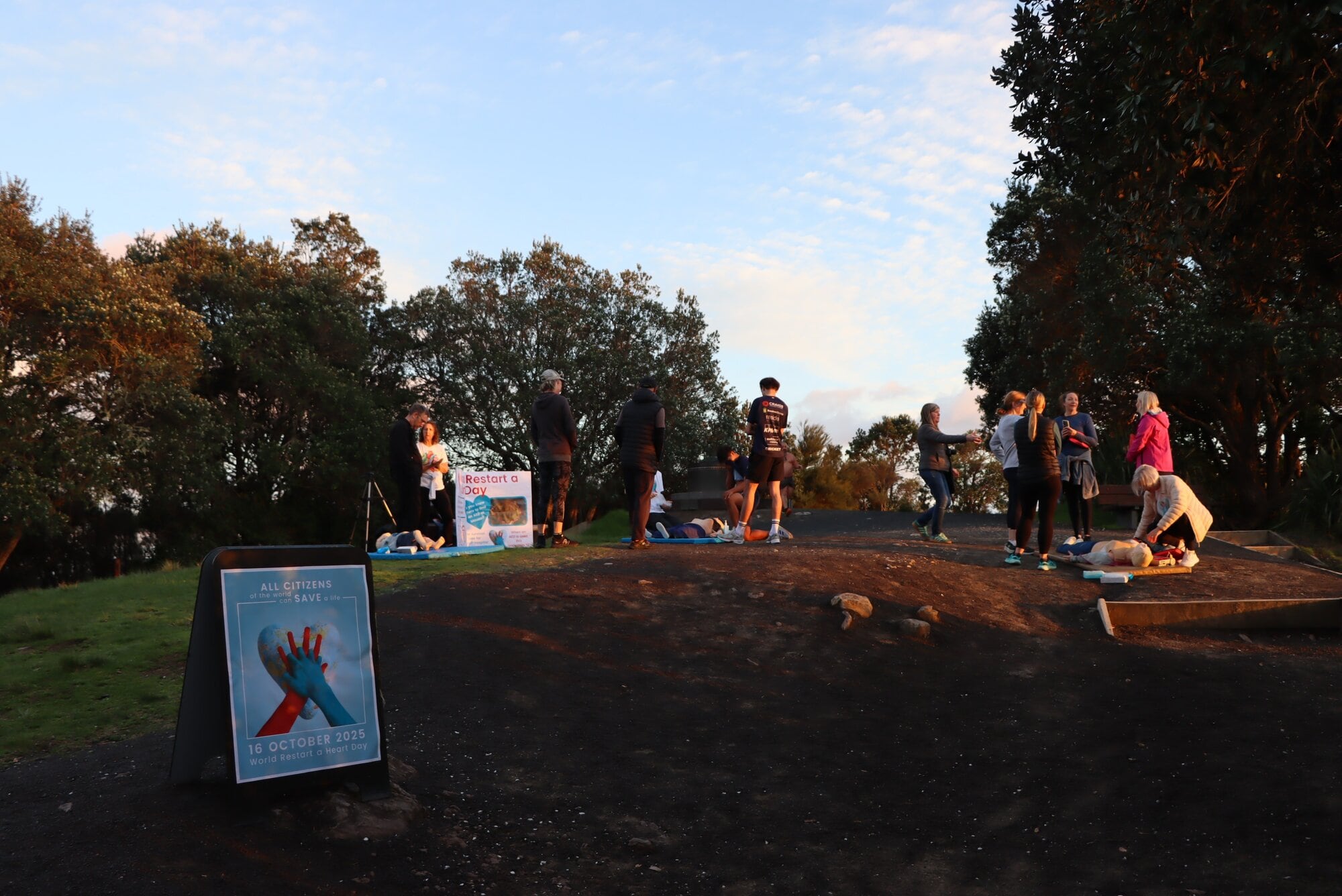 Advanced life support instructors promoted awareness about CPR and defibrillation at sunrise on Mount Maunganui for World Restart a Heart Day on October 16. Photo / Bijou Johnson