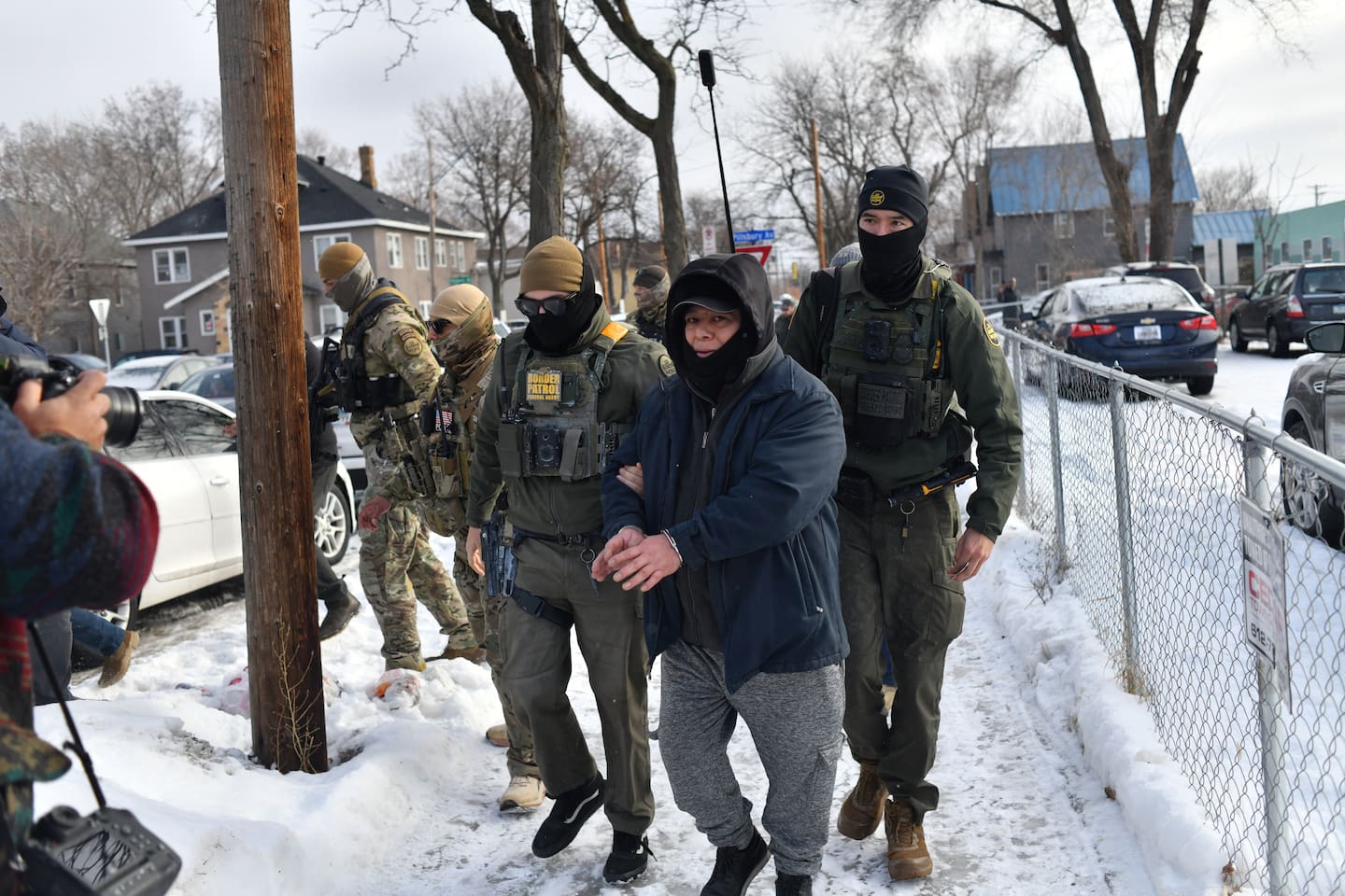 US Customs and Border Protection agents arrest a man after not providing documents proving citizenship while patrolling in Minneapolis in Minneapolis, Minnesota. Photo / Octavio Jones, AFP