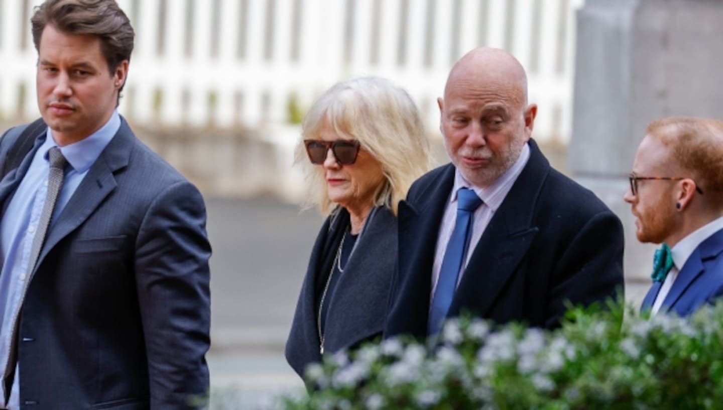 Philip Polkinghorne arrives at the Auckland High Court this morning with his lawyer Harrison Smith, sister Ruth Hughes and son Taine. Photo / Michael Craig