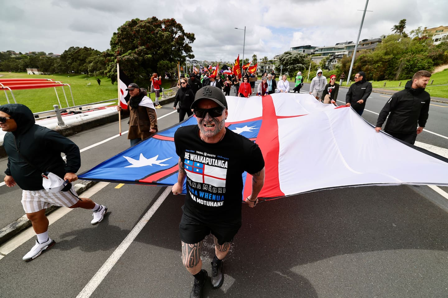 Hīkoi in solidarity with Ngāti Whātua and port workers taking place along Tamaki Drive, Auckland. NZ Herald photograph by Dean Purcell.