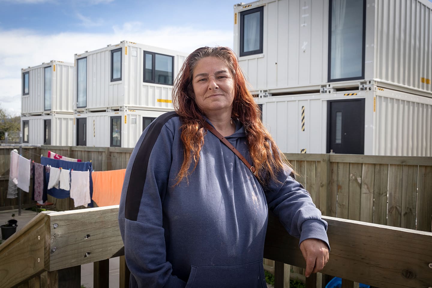 Annamaria Downes' Kāinga Ora home looks directly into the new homes, which she believes look like containers. Photo / Andrew Warner