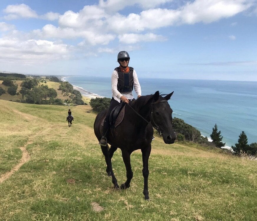  Sarah van der Boom riding her 24-year-old thoroughbred Boots around Mimiha, near Matata.  Photo / Supplied