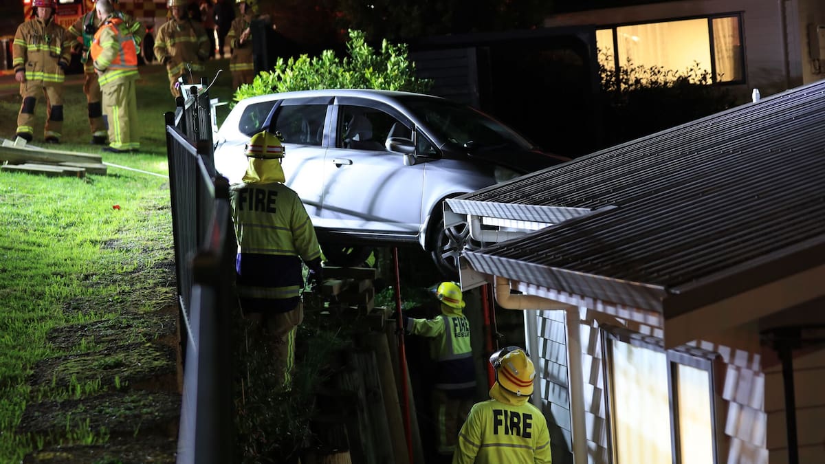 'Can't park there': Car suspended over 3m drop after crashing into North Shore house 'Can't park there': Car suspended over 3m drop after crashing into North Shore house