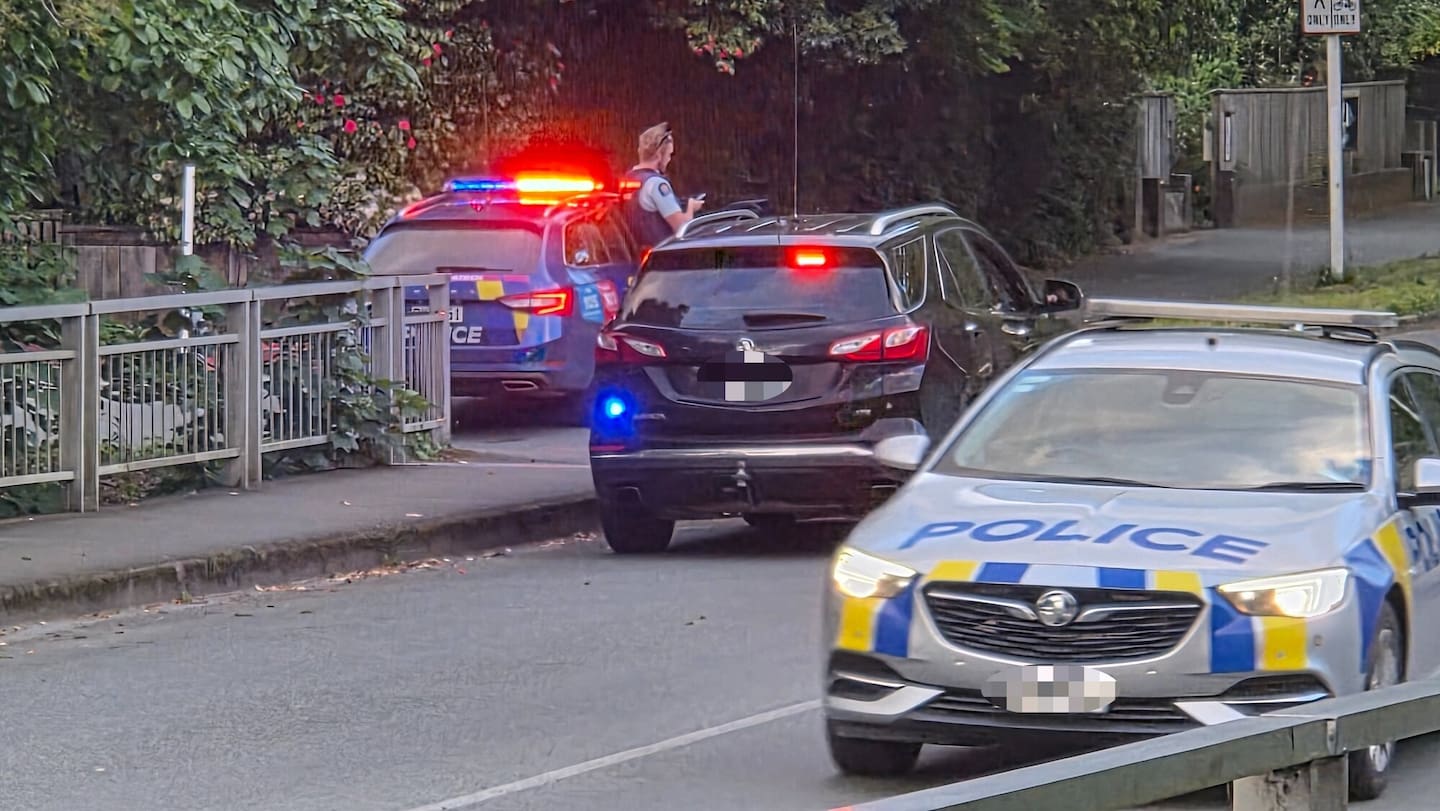 Police at one of the cordons set up on the corner of Nile St and Domett St in central Nelson during an armed standoff with with Corey Innocente, who has been sentenced in the Nelson District Court. Photo / Tracy Neal.