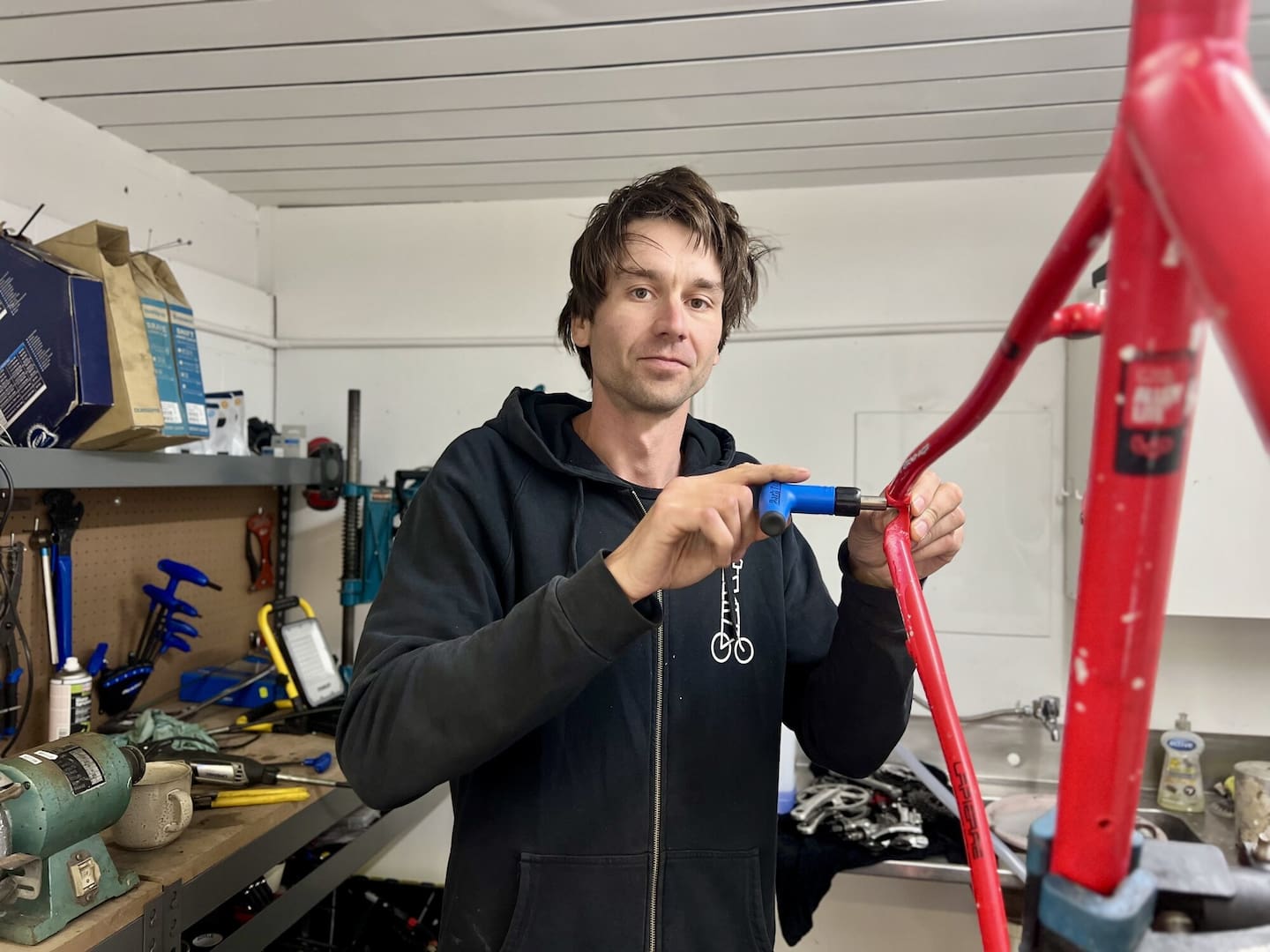 Harry van der Zanden at his bike repair business at Marewa shops. Photo / Rafaella Melo