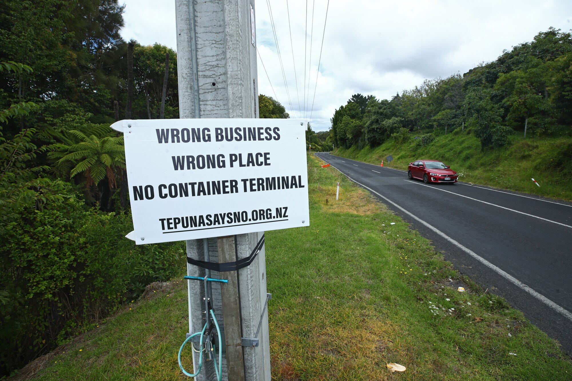 Signs are dotted around Te Puna opposing the industrial park on Te Puna Station Road. Photo / John Borren
