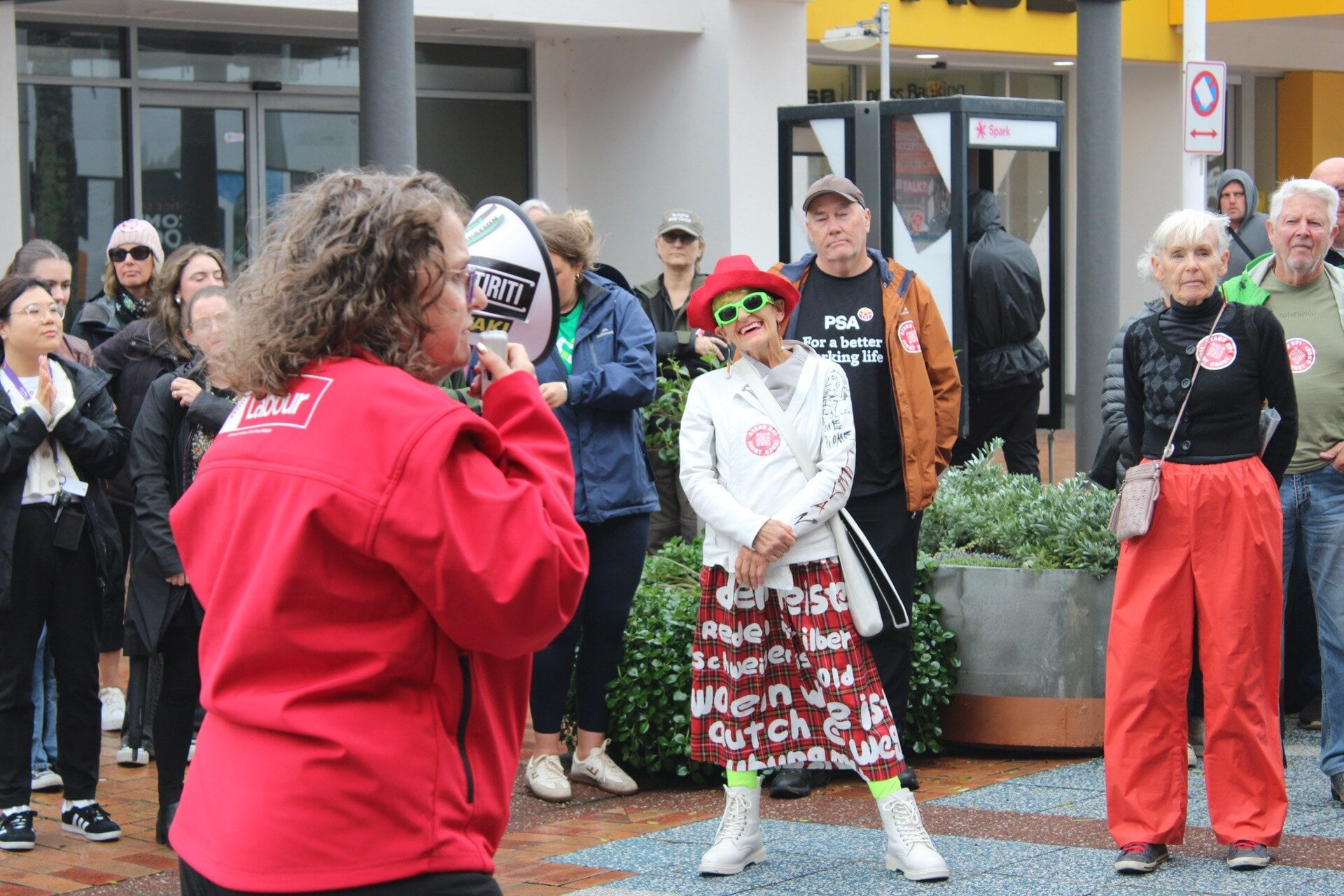 Men and women of Tauranga gathered today to protest against the changes made to the Equal Pay Act by the coalition Government. Photo / Ayla Yeoman