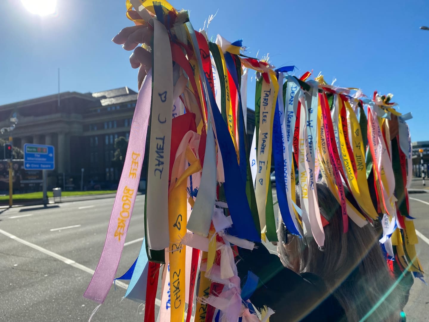 Survivors march to Parliament ahead of the release of the final report from the Abuse in Care inquiry. Photo / Azaria Howell