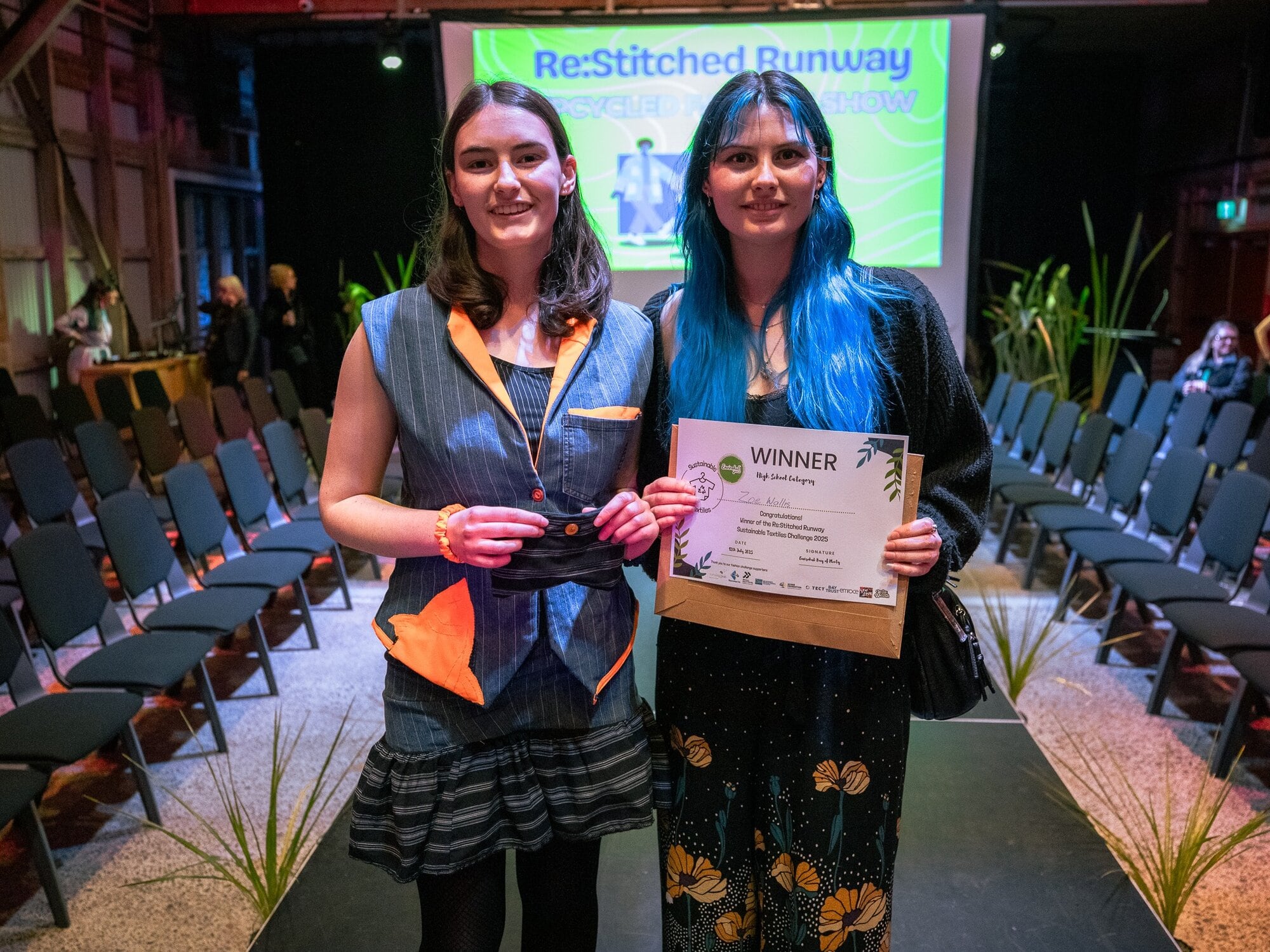  Gail Wallis, 14, wearing the design, with the winner, her sister Zoe Wallis. Photo / Morgan Hide Photography