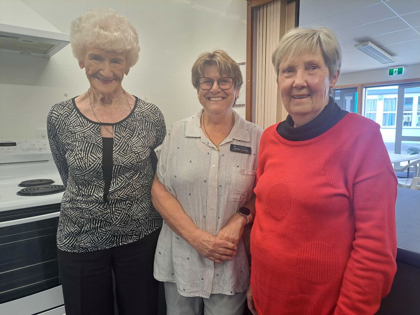Merivale School deputy principal Heather Langley flanked by two of the Kickstart Breakfast programme volunteers Bev Joblin (left) and Sandy Gilligan. Photo / Sandra Conchie