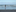 Martina Havlova first paddle in sea water at the mouth of the Manawatu River. (Her country is landlocked).