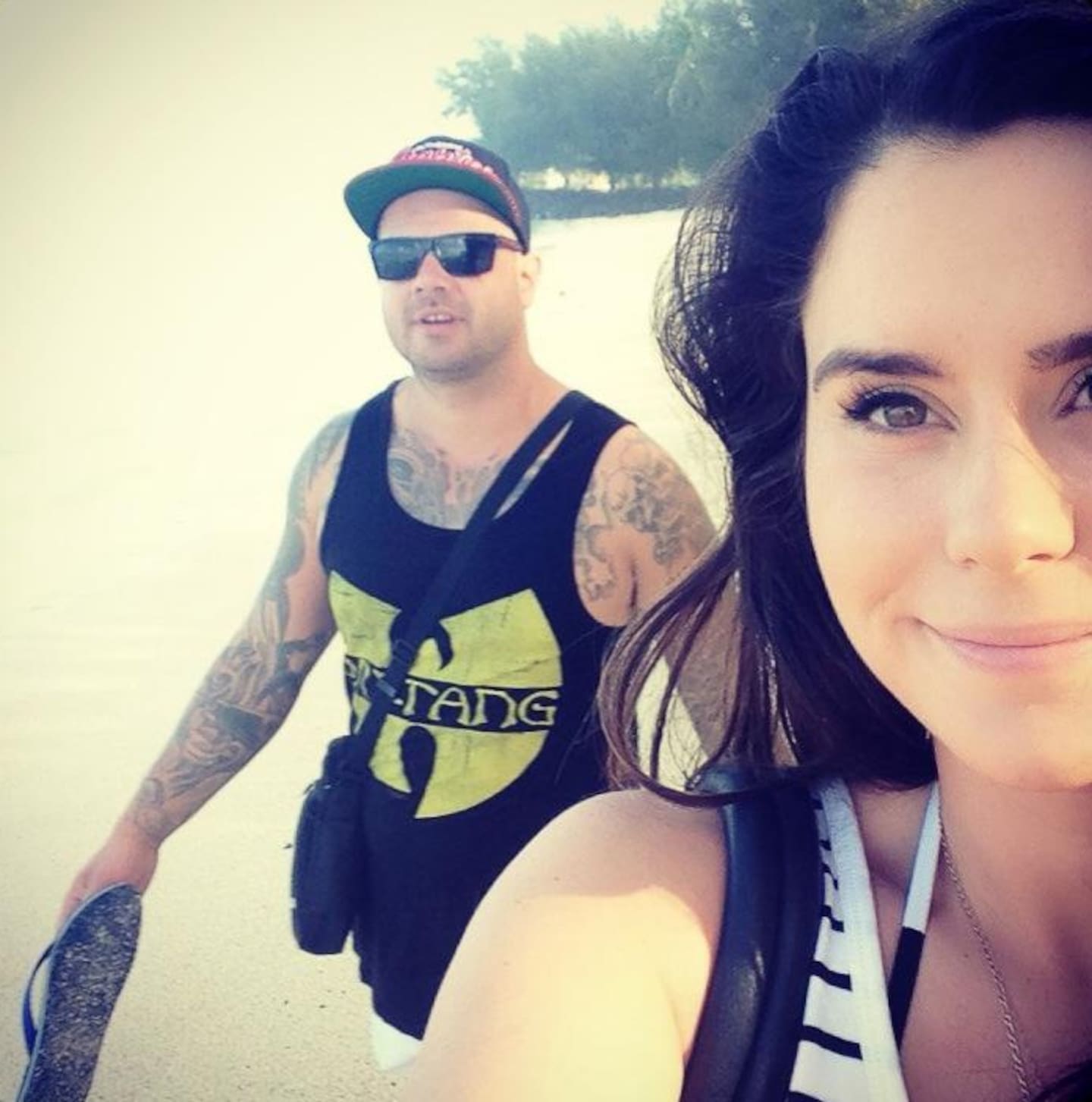 Connor Morris (left), who was killed by Michael Murray, pictured with his partner Millie Elder-Holmes (right).