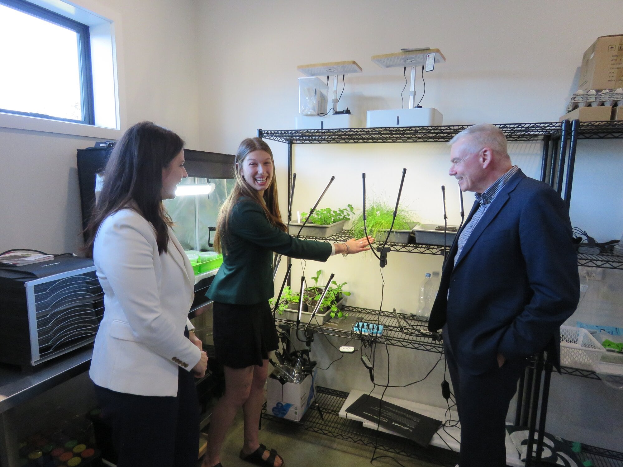  Education Minister Erica Stanford and Coromandel MP Scott Simpson were shown equipment and projects inside GrowHub facility by senior student Millie Lochore Photo / Merle Cave