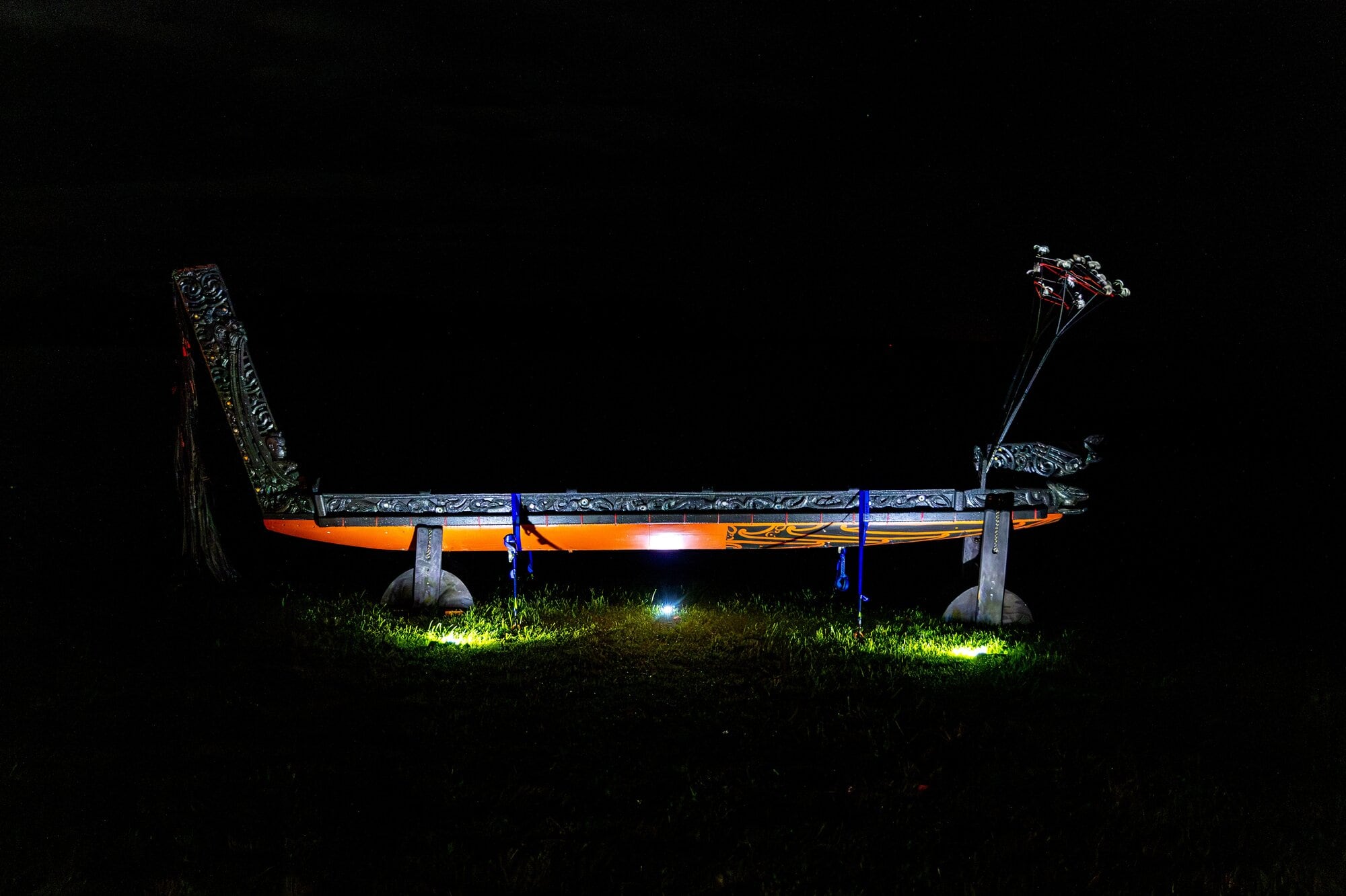  The Waka Taua was illuminated at Katikati’s Matariki Dawn Service last Friday. Photo / Anna Menedez