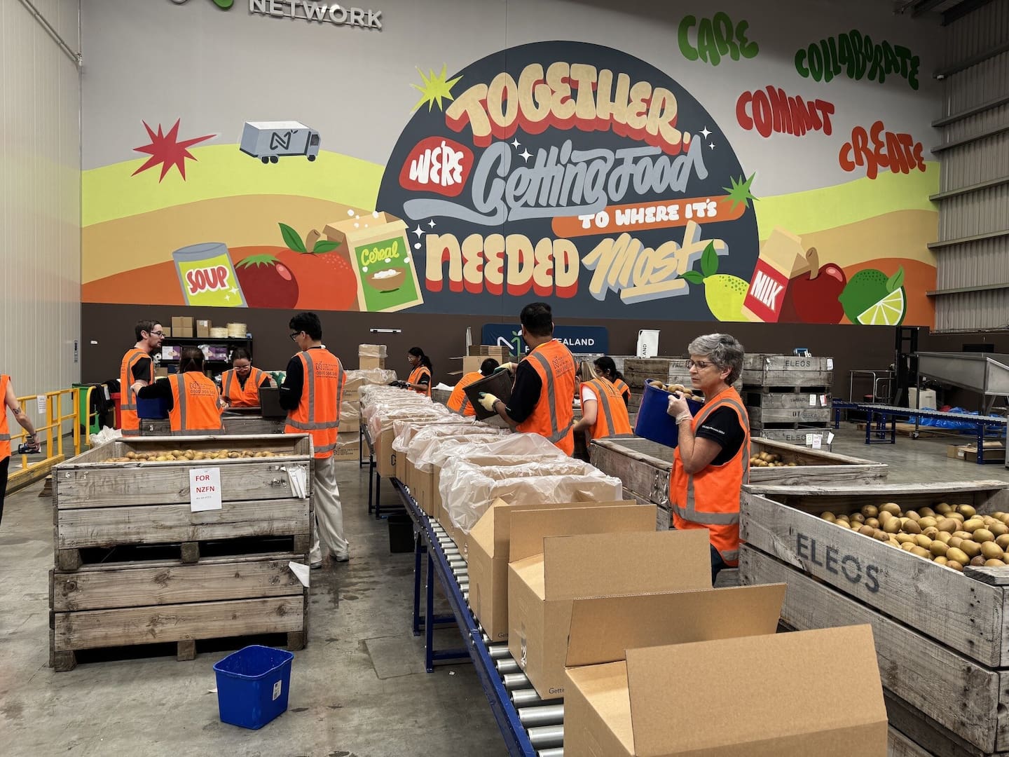 DHL volunteers help sort rescued kiwifruit for NZ Food Network. Photo / NZ Food Network