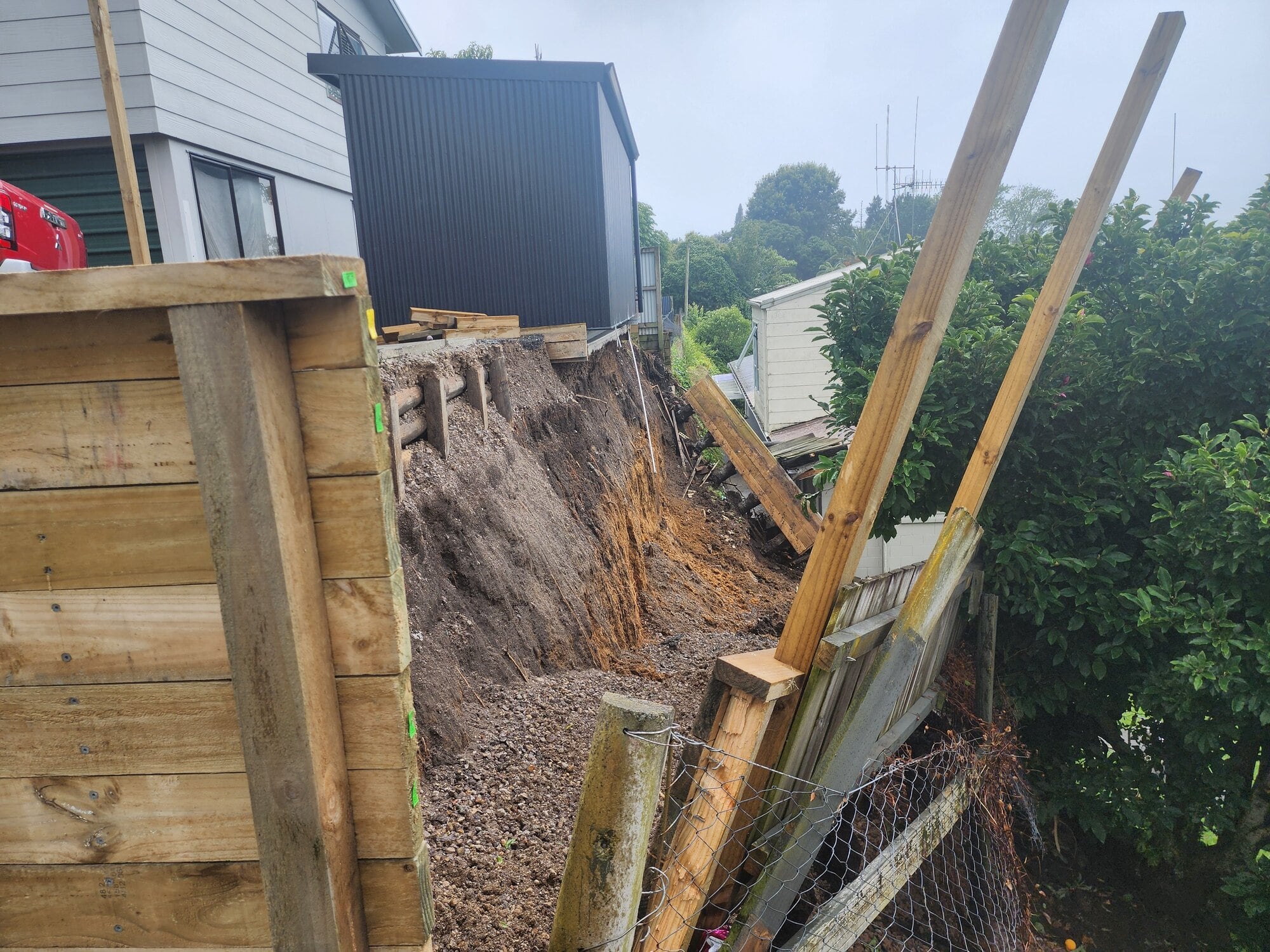  A retaining wall at the back of Philip Raath's property in Greerton collapsed after the deluge of rain on Wednesday. Photo / Supplied