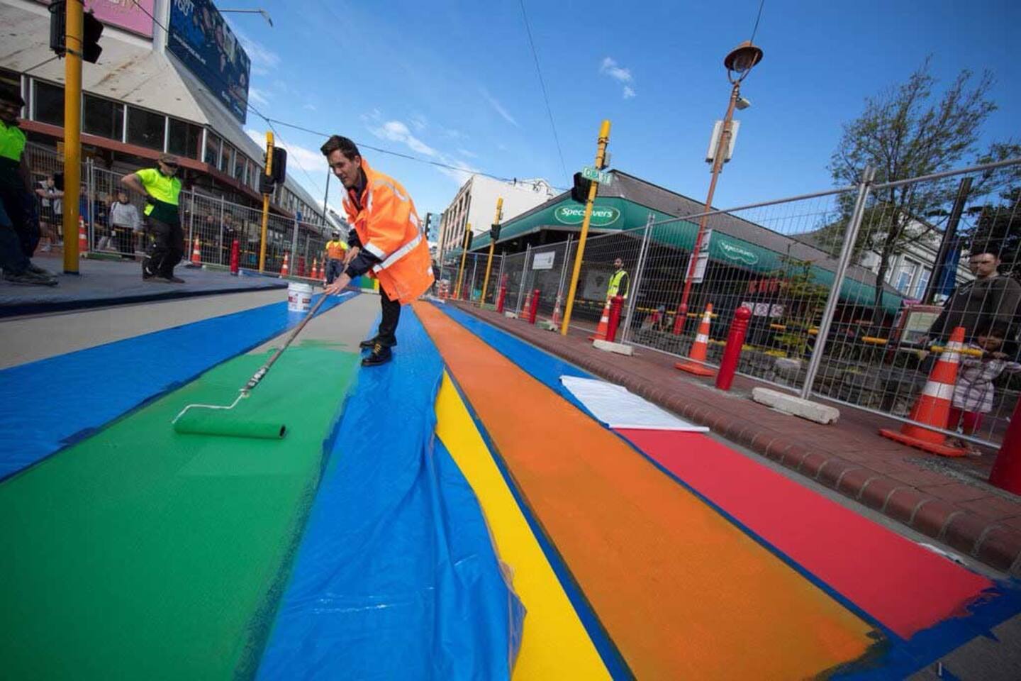 Justin Lester painting Wellington's rainbow crossing in October 2018. Photo / Supplied.