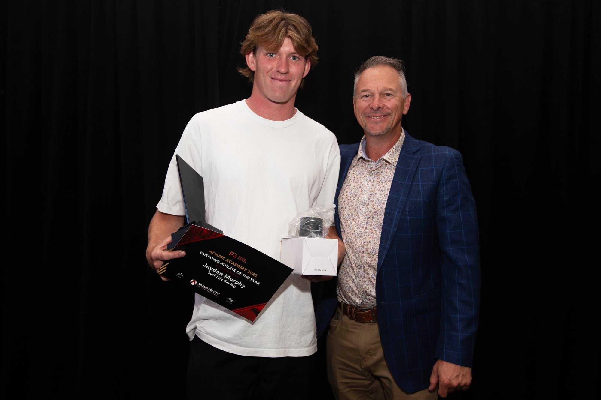 Jayden Murphy, Emerging Athlete of the Year, with general manager of Carrus, Scott Adams. Photo / Supplied