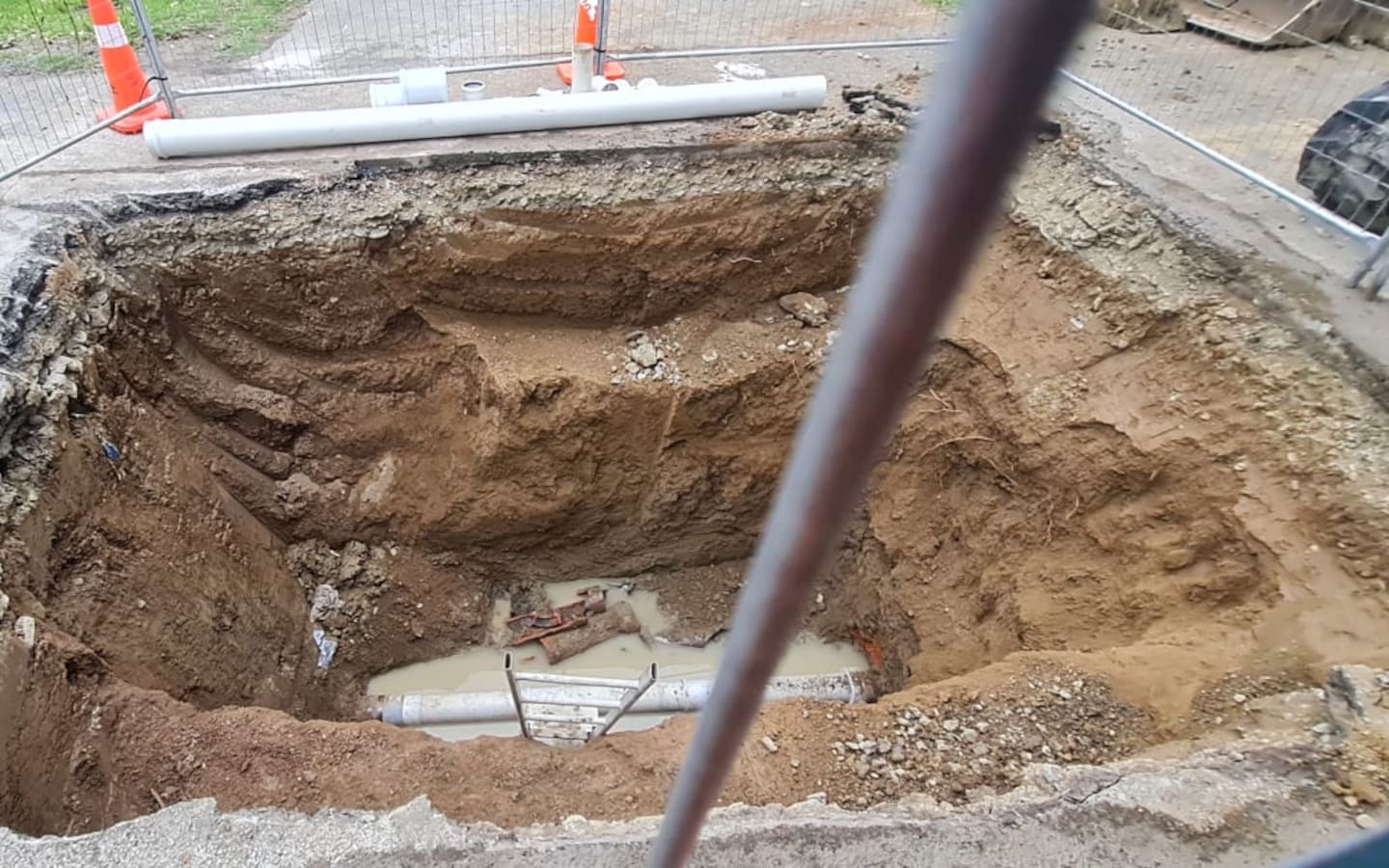 The much larger hole that was dug to investigate the sinkhole on Halifax St East, Nelson. Photo / John-Paul Pochin