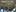 June 6: A grab from a video provided by BP PLC shows the oil leak still pouring out of the well head around the capping device in the Gulf of Mexico. Photo / AP