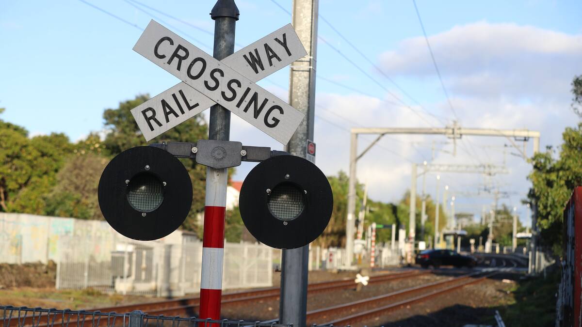 Man, child dead after pram falls on to train tracks Man, child dead after pram falls on to train tracks