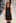 A model wears a design by Kate Sylvester as part of the Little Black Dress show. Photo / Getty Images