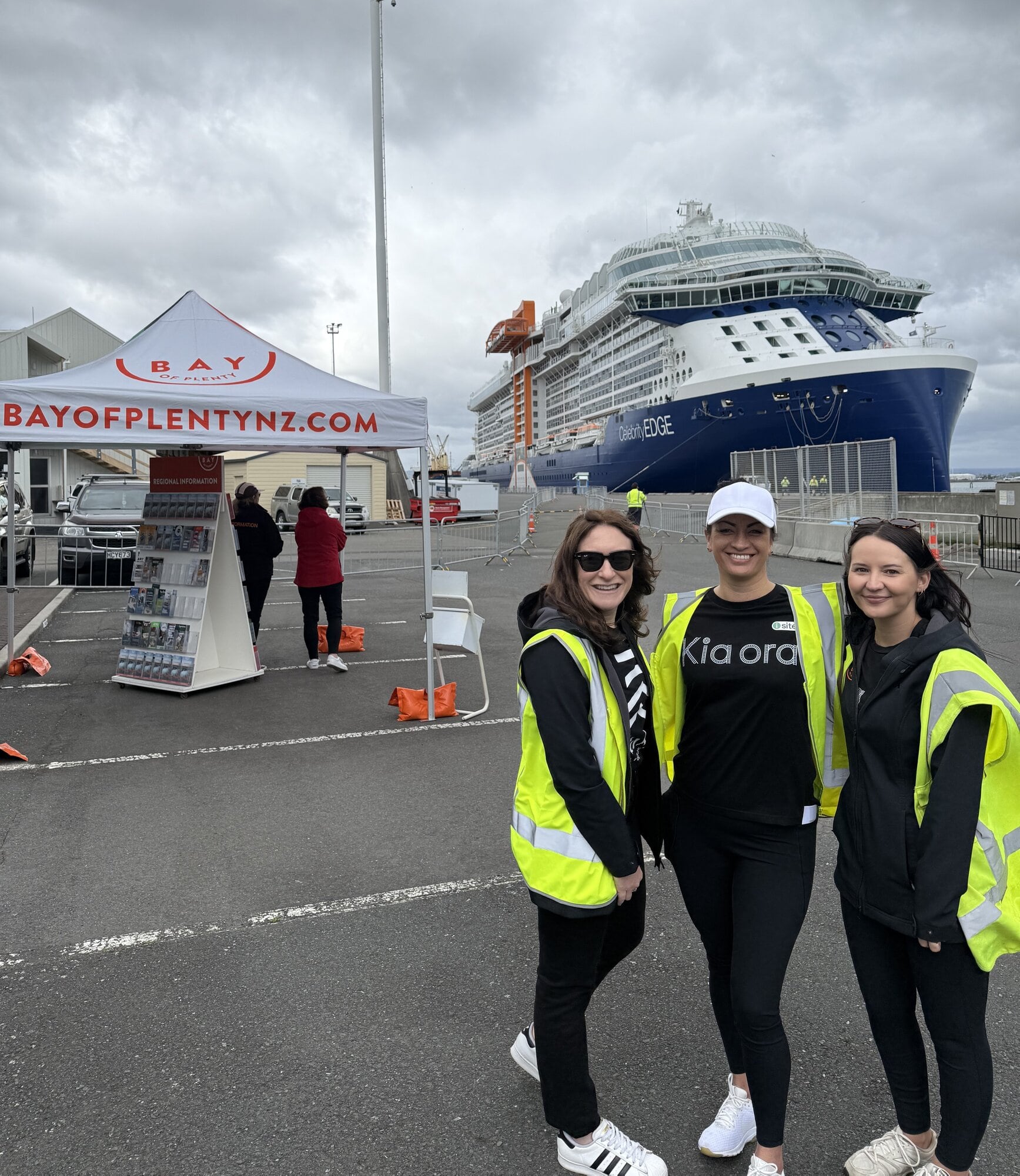 Tourism Bay of Plenty cruise team members (from left) Danielle Goodall, Mary Tolley, and Nicole Ellis, prepare to welcome visitors from the Celebrity Edge. Photo / Supplied