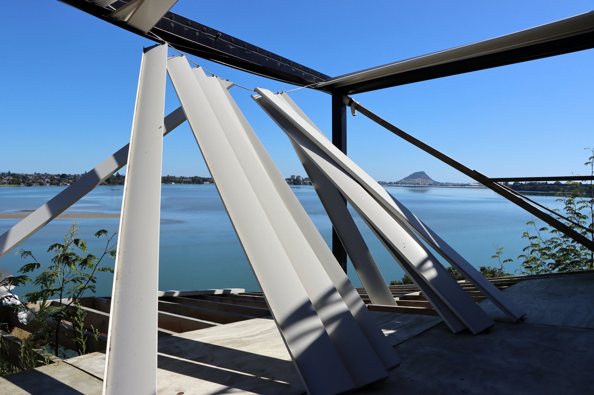 Brian and Melanie Gardner's deck is now floating in mid-air after a slip in July 2022. Photo / Alisha Evans