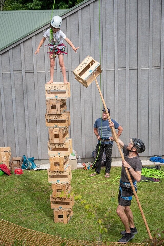 Highlights for older children include stack-a-crate (pictured), a flying fox, orienteering and archery. Photo / Supplied