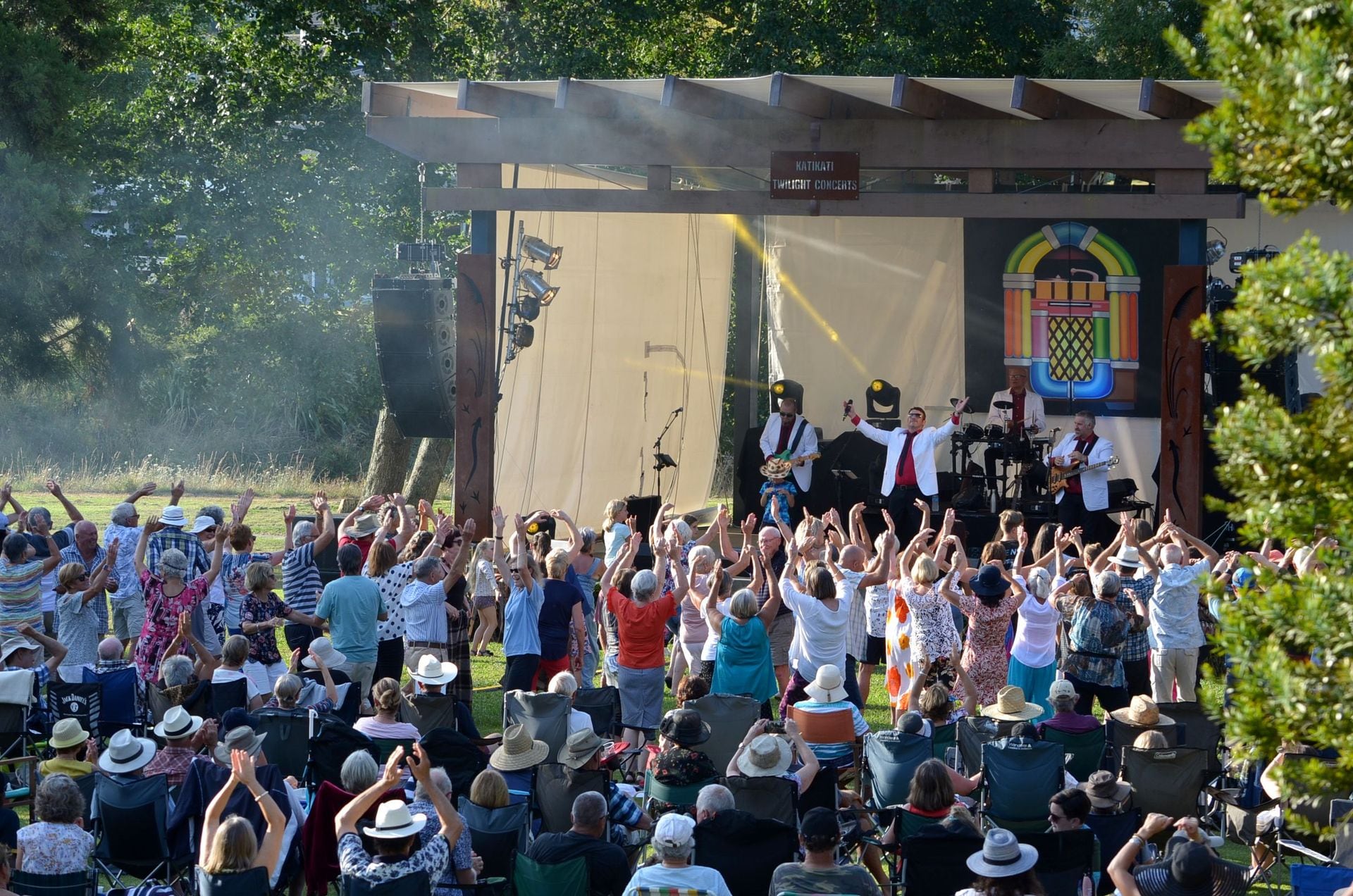 The crowd up dancing at a Katikati Twilight Concert.