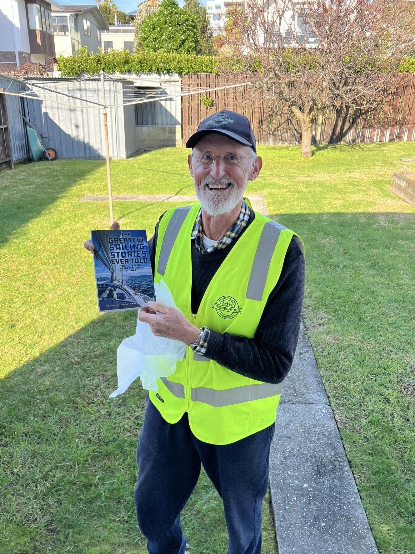  Bill Webb enjoys a “fruit of labour” gift from a Swiss volunteer before their return home. Photo / Bill Webb