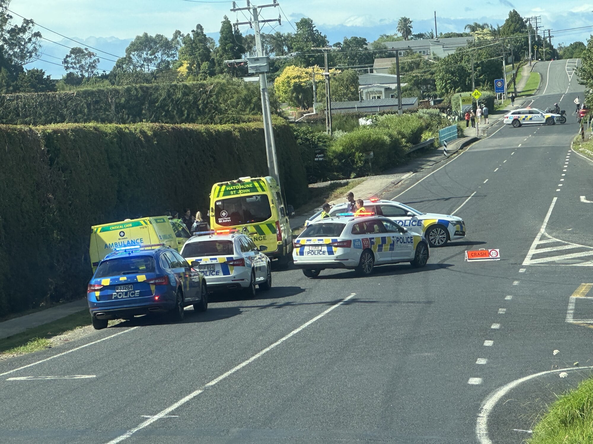  Emergency services at the scene of a vehicle crash on Te Puna Road.  Photo / Claire Rogers
