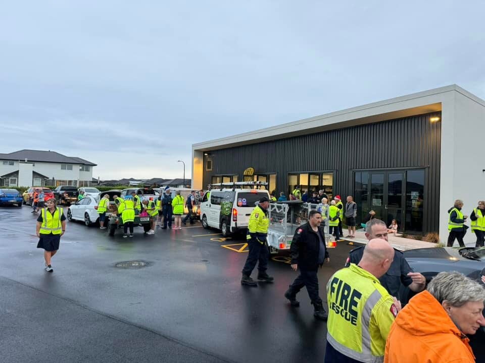 Emergency services volunteers helping with a previous Pāpāmoa Emergency Food Drive.