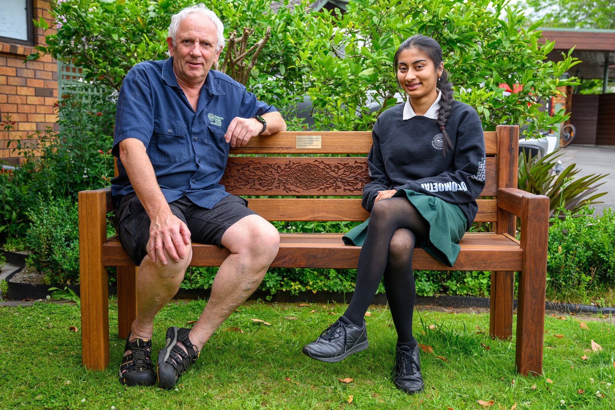 Ōtūmoetai College’s head of technology Kevin Meyer with Zainab Harmine on the finished seat at Radius Matua. Photo / David Hall