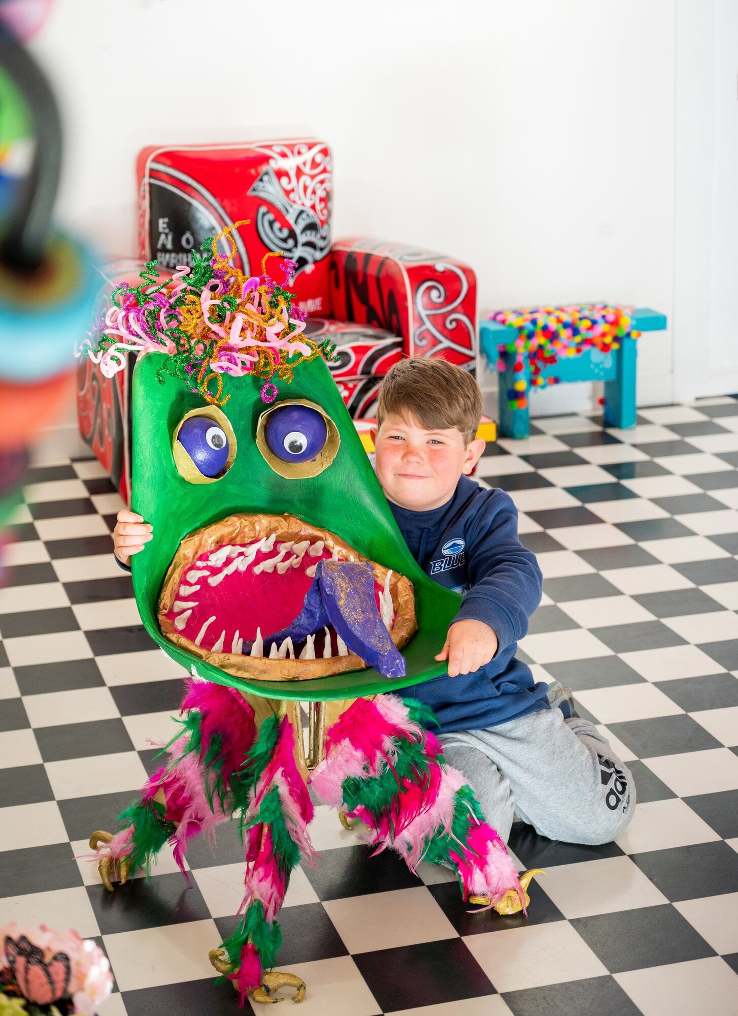 Harry Ward with his ‘Arragog the Monster’ chair. Photo / Brydie Thompson