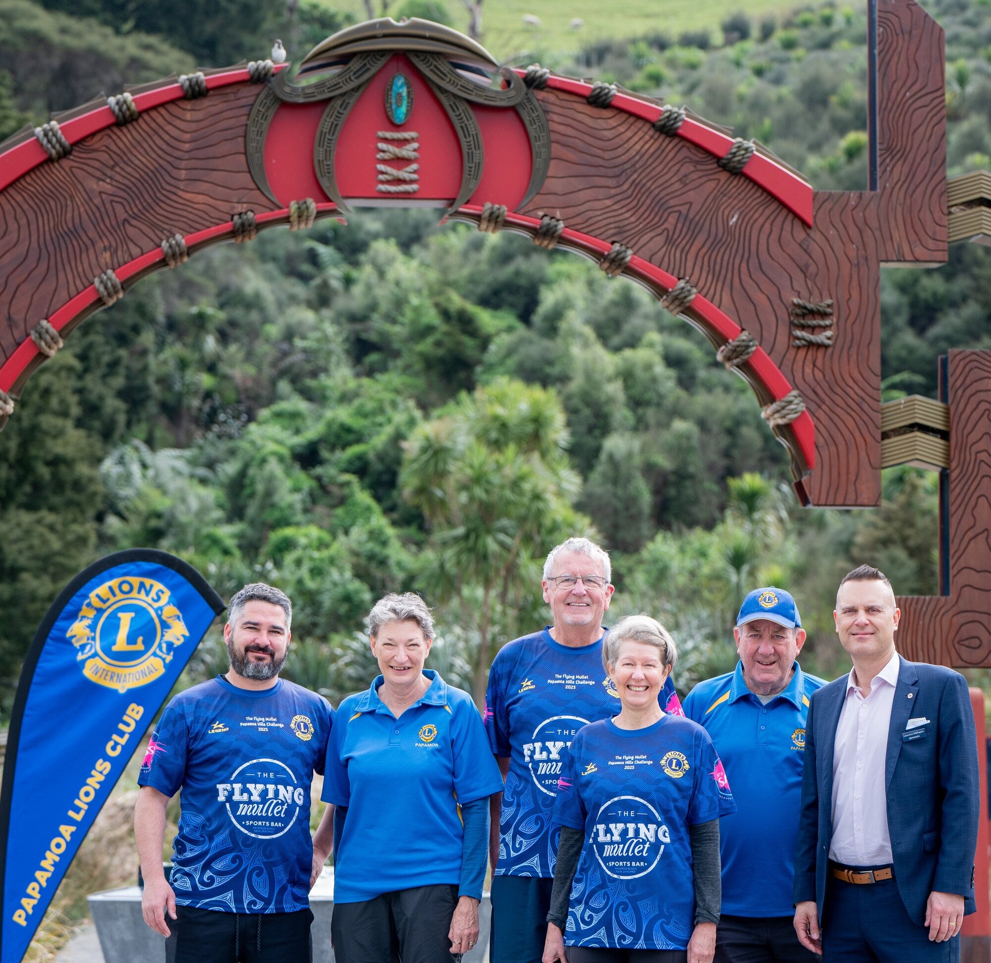 Mark Grant, Sue McCowan, Steven Jensen, Audrey Jensen, Ross McCowan and Lawrence Millington invite people to enter the Flying Mullet Papamoa Hill Challenge. Photo / Brydie Thompson