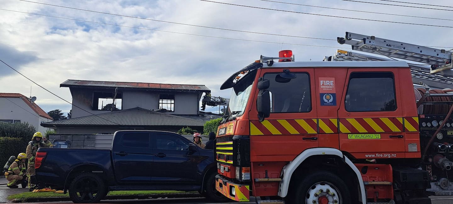 Emergency services at the scene of a house fire on Golf Rd near intersection of Fairway Ave. Photo / Sandra Conchie
