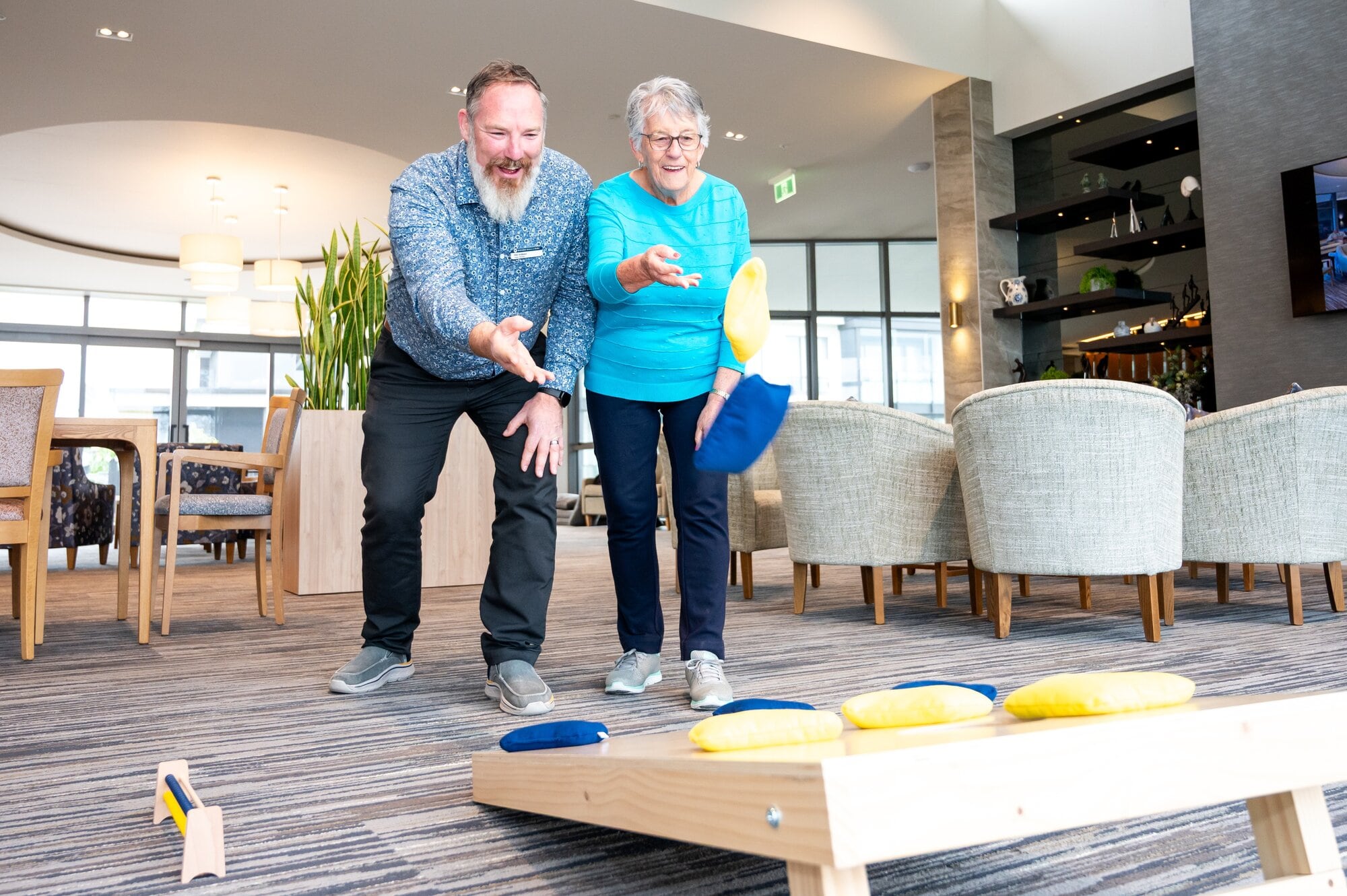 Phil Holland and Pat Purton  Bayview Village manager Phil Holland and resident Pat Purton are looking forward to the first ever Tauranga Seniors Corn Hole Championship. Photo / Brydie Thompson
