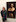 Glenda Fryer stands by the Mark Rayner art work (pixelated image). Photo / via Facebook